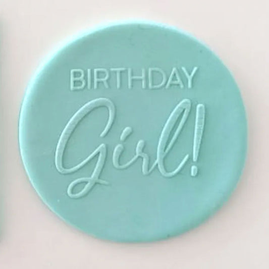 birthday girl! pattern from debosser on round circle of blue fondant