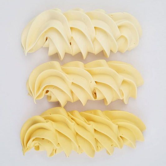 buttercream colour examples of the buttercream yellow gel colour on a white background