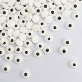 edible 1cm eyes shaped sprinkles scattered on a white background