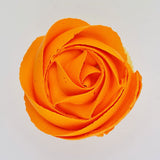 orange buttercream rose piped on to a muffin using the gobake dahlia orange gel colour