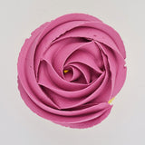 pink buttercream rose piped on to a muffin using the gobake fuchsia pink gel colour 