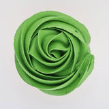 green buttercream rose piped on to a muffin using the gobake moss green gel colour