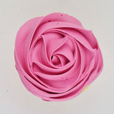 pink buttercream rose piped on to a muffin using the gobake neon pink gel colour