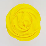 yellow buttercream rose piped on to a muffin using the gobake neon yellow gel colour