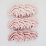 buttercream colour examples of the rose quartz gel colour on a white background