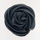 black buttercream rose piped on to a muffin using the gobake super black gel colour  Edit alt text