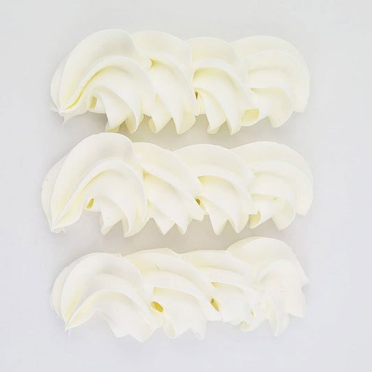 buttercream colour examples of the super white gel colour on a white background