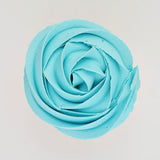 blue buttercream rose piped on to a muffin using the gobake Tiffany blue gel colour