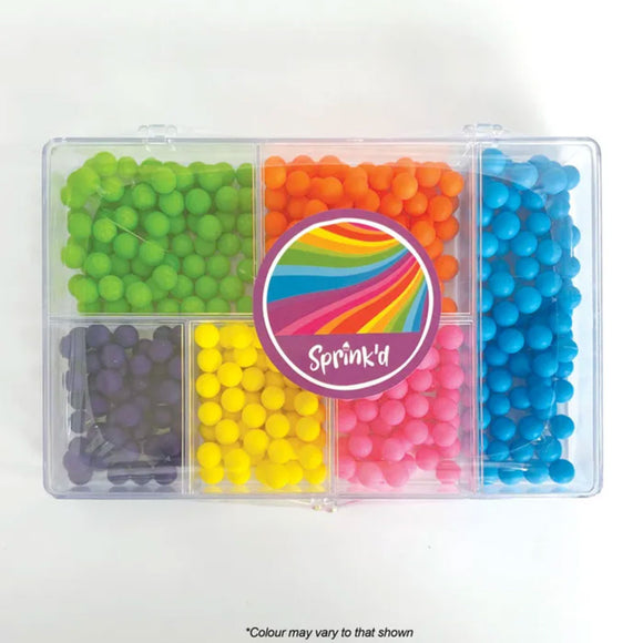 sprink'd rainbow mix bento box sprinkles of yellow, green, orange, pink, blue and purple sugar ball sprinkles in a clear container