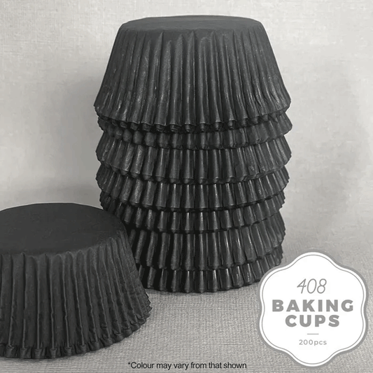 black paper baking cups stacked upside down on a grey background