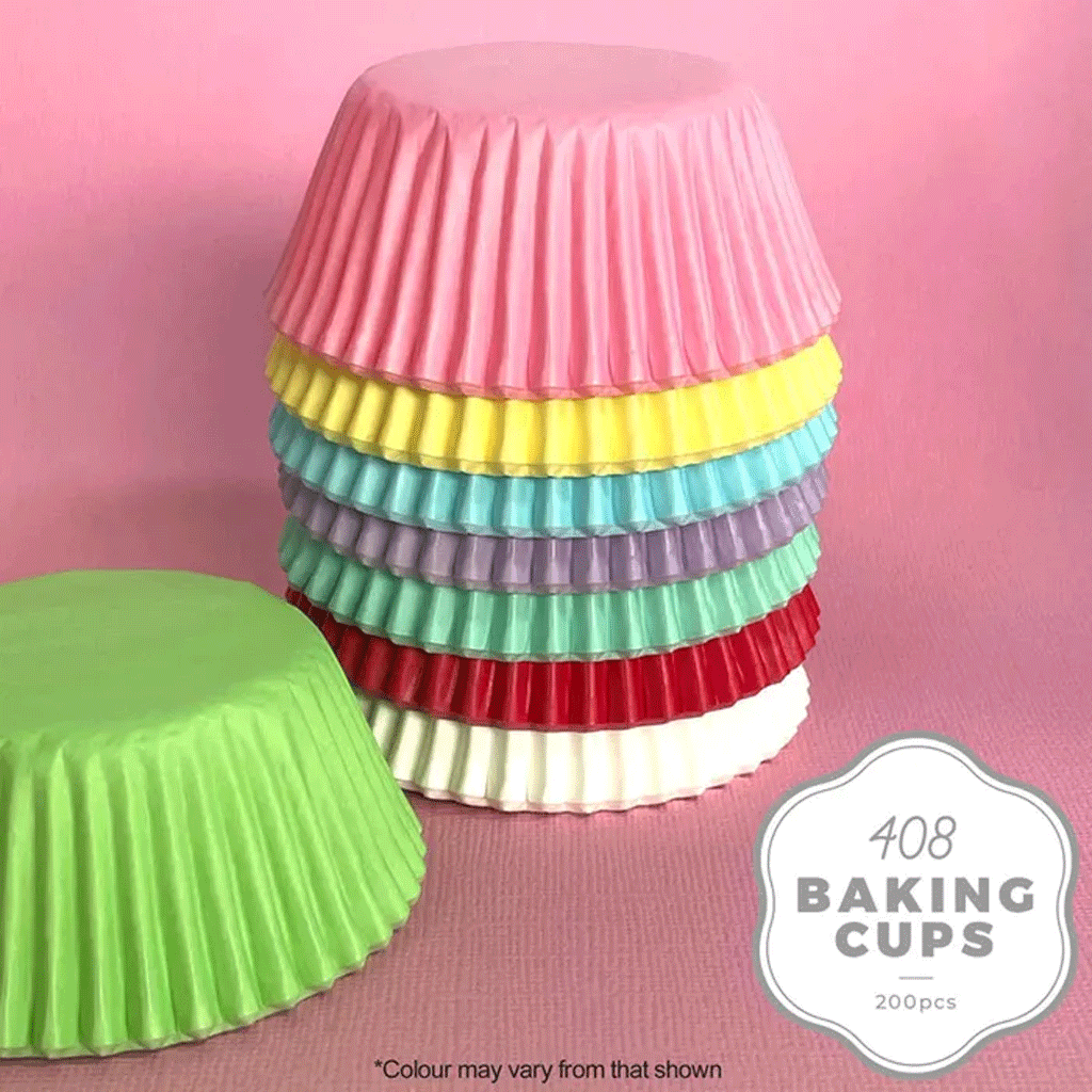green pink yellow blue purple teal red and white paper baking cups stacked together upside down on a pink background