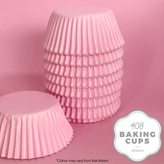 pink paper baking cups stacked upside down on a pink background
