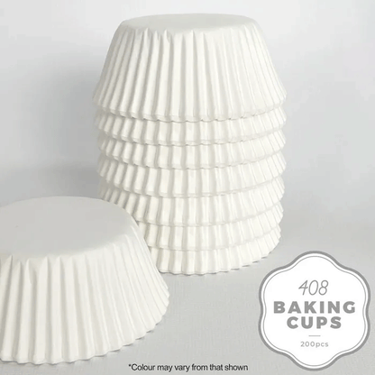 white paper cupcake baking cups stacked upside down on a white background
