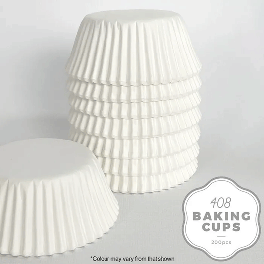 white paper cupcake baking cups stacked upside down on a white background
