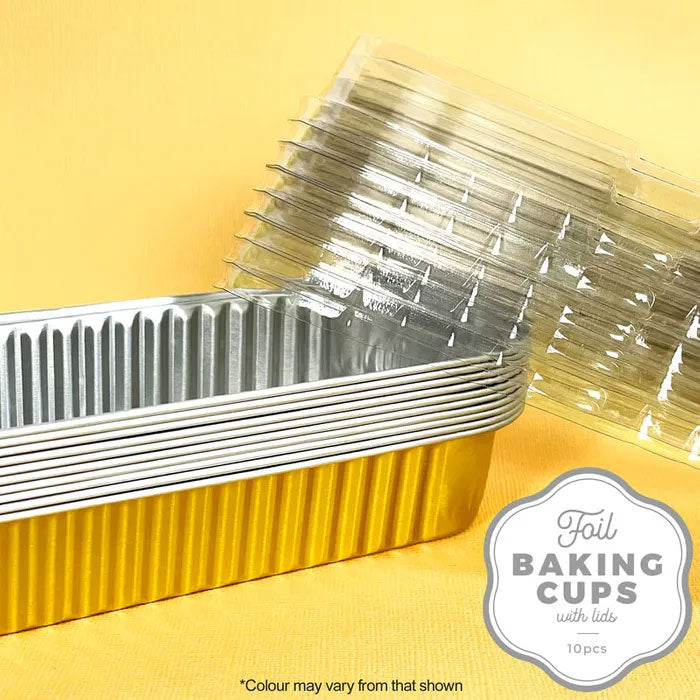 foil baking cups gold stacked with plastic lids on the side on a yellow background