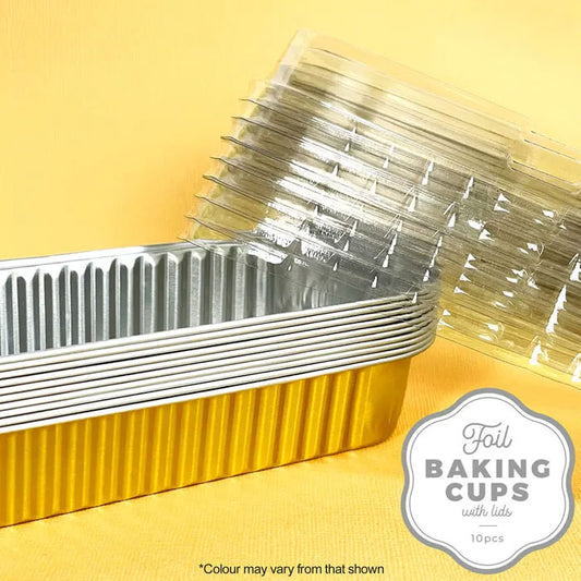 foil baking cups gold stacked with plastic lids on the side on a yellow background