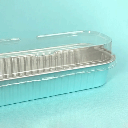 blue silver foil rectangle baking cup with clear plastic lid on top 