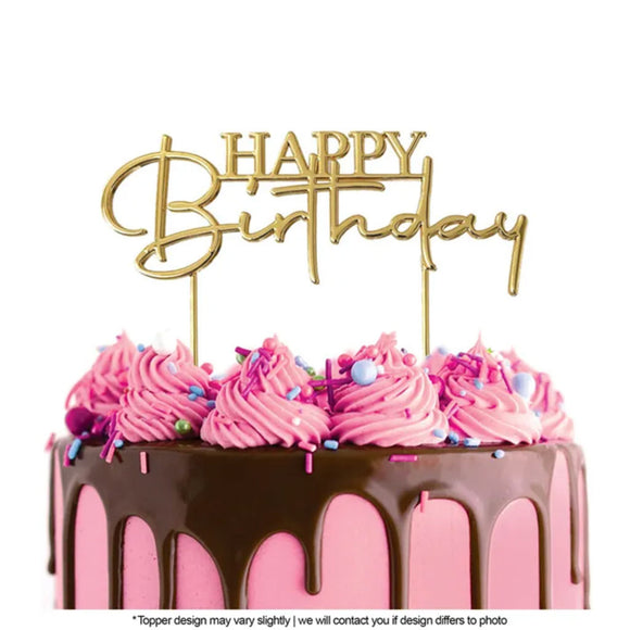 Cake Craft Happy Birthday Style #2 Gold Metal Cake Topper placed on a pink cake with chocolate cake drip