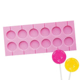lollipop silicone mould to make 12 lollipops with a pink and yellow lollipops below