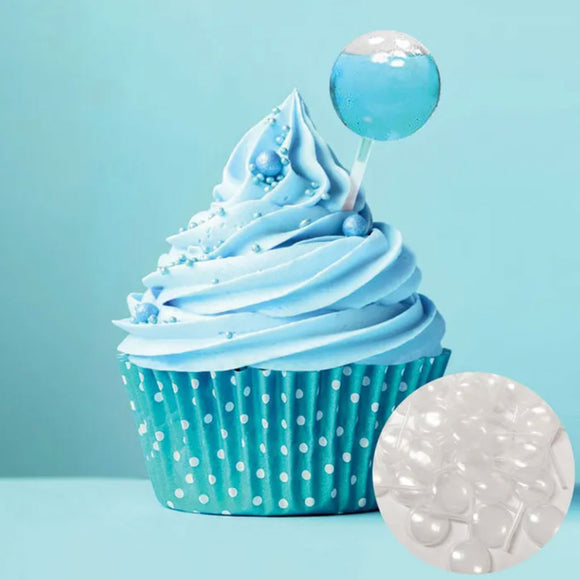 Round Pipette full of flavour inserted into blue cupcake with blue icing