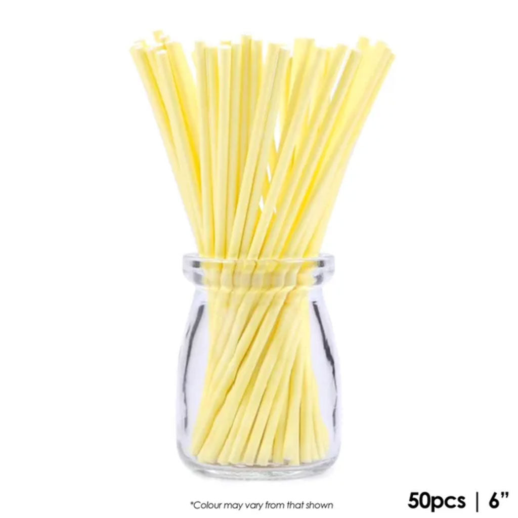 cake craft yellow paper pop sticks in glass jar