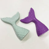 blue and purple chocolate mermaid tails made using bib mermaid tail moulds