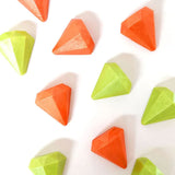 orange and green coloured diamonds assorted on a white background