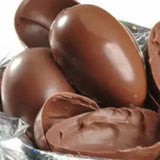 Bunch of chocolate Easter eggs with one opened