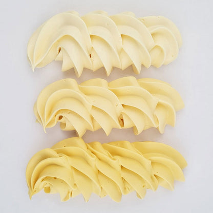 buttercream colour examples of the buttercream yellow gel colour on a white background