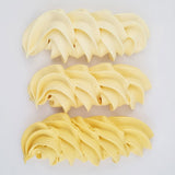 buttercream colour examples of the buttercream yellow gel colour on a white background