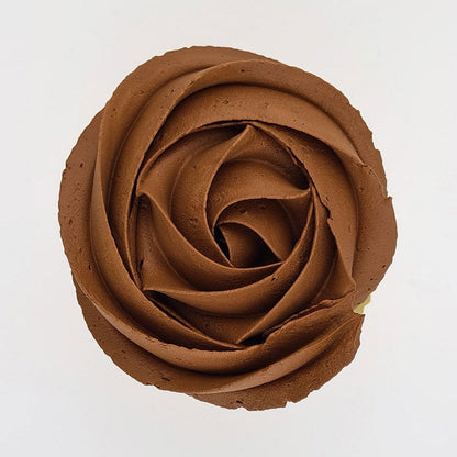 brown buttercream rose piped on to a muffin using the gobake chocolate brown gel colour