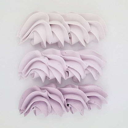buttercream colour examples of the lavender gel colour on a white background