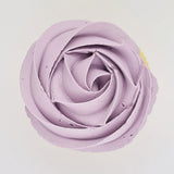 purple buttercream rose piped on to a muffin using the gobake lavender gel colour