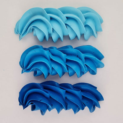 buttercream colour examples of the navy blue colour on a white background