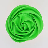 green buttercream rose piped on to a muffin using the gobake neon green gel colour