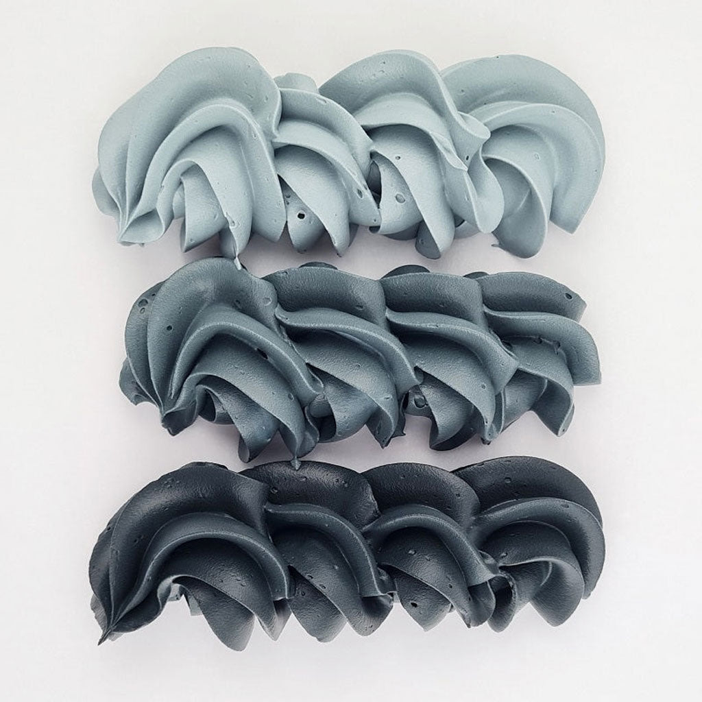 buttercream colour examples of the super black gel colour on a white background