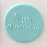 Happy anniversary pattern from debosser on round circle of blue fondant