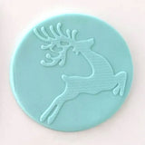 reindeer pattern from debosser on round circle of blue icing