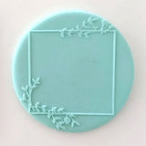 square frame pattern from debosser on round circle of blue fondant