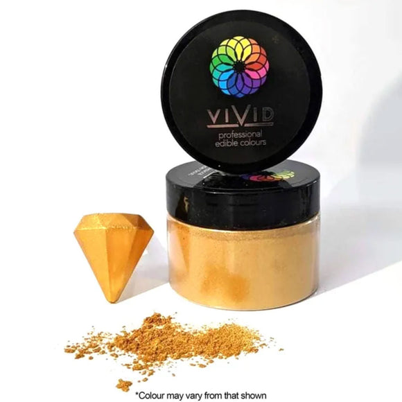 Vivid Warm Gold Edible Metallic Dust in pot with dust sprinkled in front and diamond painted blush to show colour